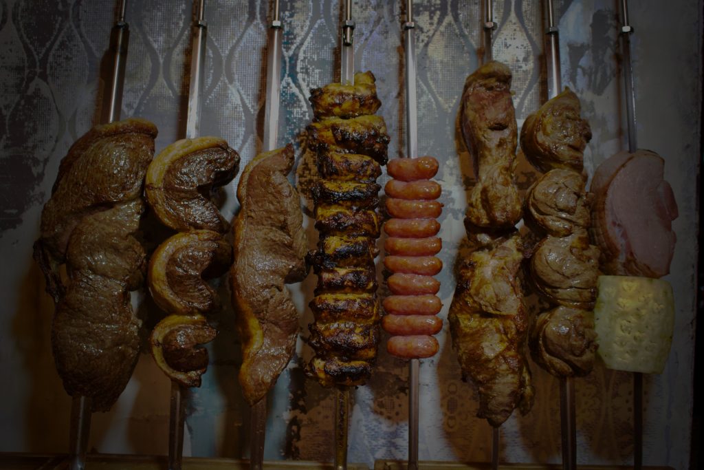Estabulo Cuts of different meats on skewers